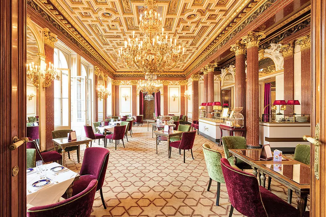 A Viennese salon in gilt and crystal chandeliers.